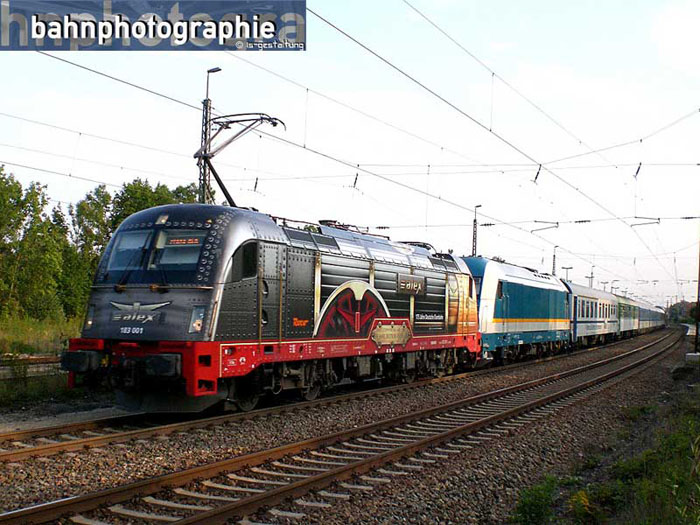 183001