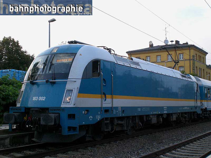 183002