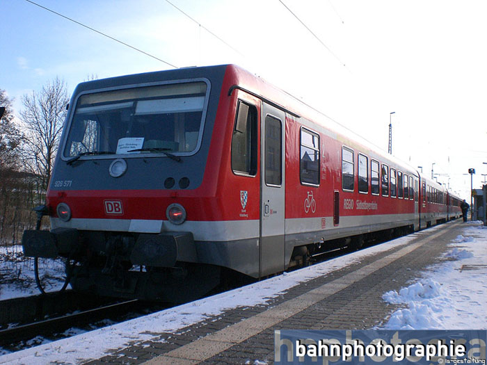 628571